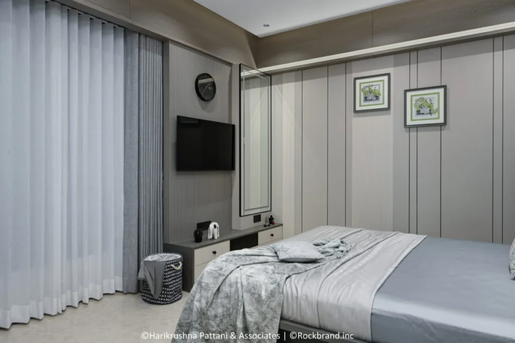 Master bedroom grey wall panel design in luxury 4 BHK apartment Ahmedabad